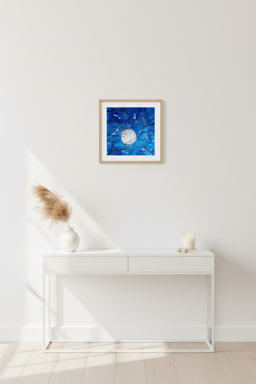 Blue Pull art print above a coastal console table